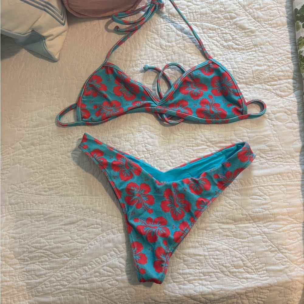 Frankie’s Bikinis bikini set. Size large in both top and bottom. Like new!
